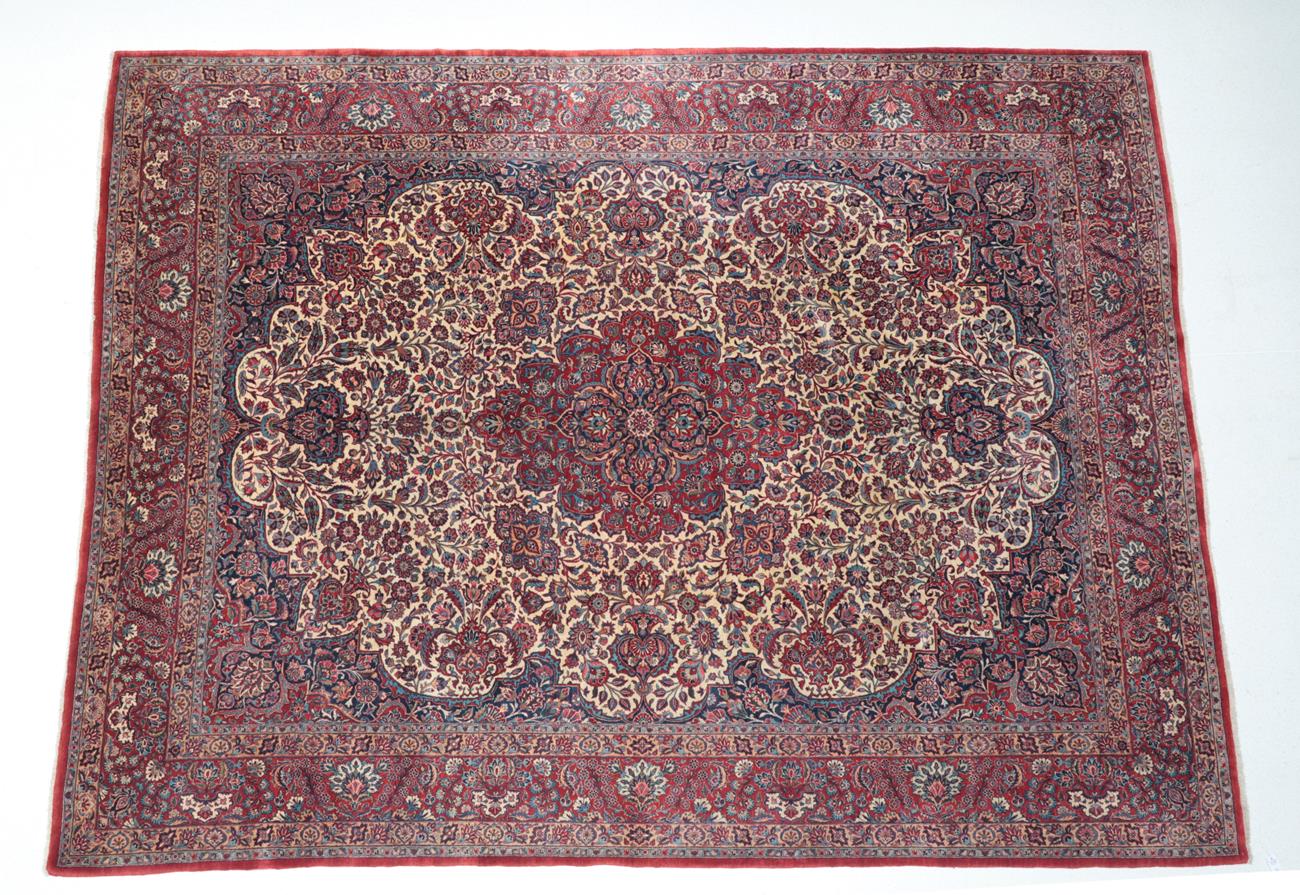 Lot 541 - Fine Kashan Carpet Central Iran, circa 1930 The ivory field of flowering plants and vines...