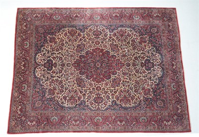 Lot 541 - Fine Kashan Carpet Central Iran, circa 1930 The ivory field of flowering plants and vines...