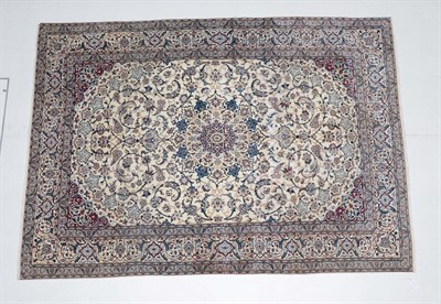 Lot 544 - Nain Carpet Central Iran, circa 1960 The ivory field scrolling vines around a central medallion...