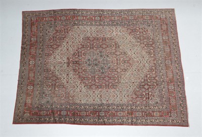 Lot 551 - Tabriz Carpet North West Iran, circa 1920 The ivory field of Herati design centred by a soft...