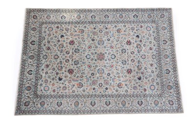Lot 552 - Kashan Carpet Central Persia, 2nd half 20th century The ice blue field with a lattice of...