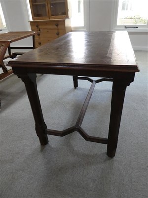 Lot 564 - A Late Victorian Oak and Parquetry Decorated Dining Table, stamped and labelled Howard & Sons,...