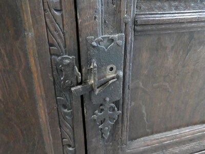 Lot 575 - A Late 17th Century Joined Oak East Anglian Food Cupboard, with central cupboard door all...