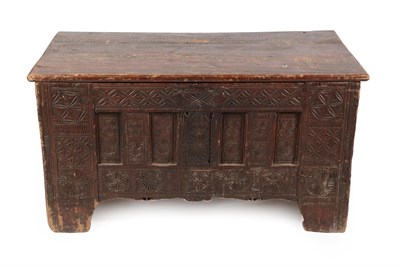 Lot 576 - A 16th Century Pine Clamp-End Chest, probably North Germany or Sweden, the hinged lid above a...