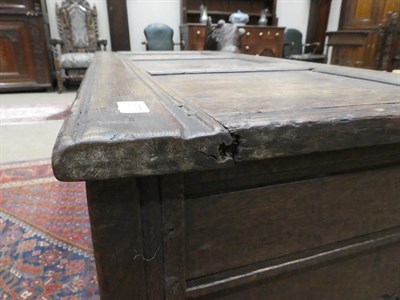 Lot 577 - A 16th Century Joined Oak Chest, the panelled and hinged lid above a carved frieze with two...