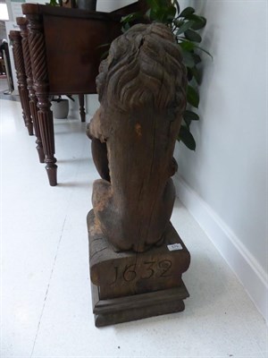Lot 579 - A Pair of Carved Oak Lions, one carved with the date 1632, the other carved ANNO, each modelled...