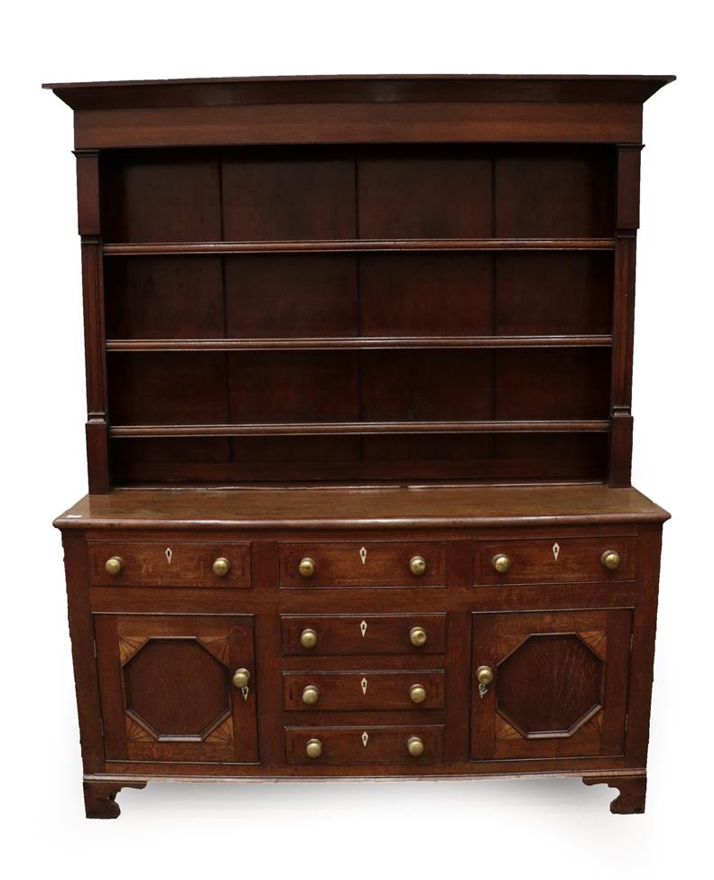 Lot 582 - A 19th Century Anglesey Oak Dresser, the rack with three fixed shelved, the base with five...