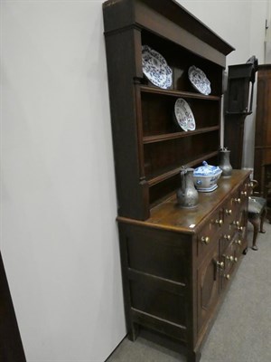 Lot 582 - A 19th Century Anglesey Oak Dresser, the rack with three fixed shelved, the base with five...
