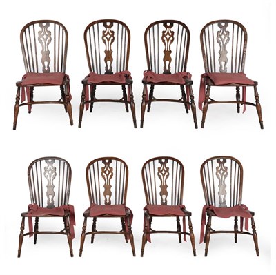 Lot 595 - A Set of Eight Windsor Style Dining Chairs, modern, with pierced splats and spindle back...
