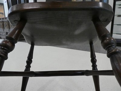 Lot 595 - A Set of Eight Windsor Style Dining Chairs, modern, with pierced splats and spindle back...