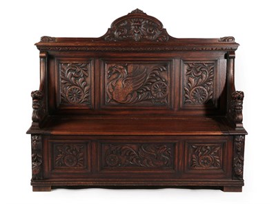 Lot 602 - A Victorian Carved Oak Hall Bench, late 19th century, the carved pediment centred by a Green...