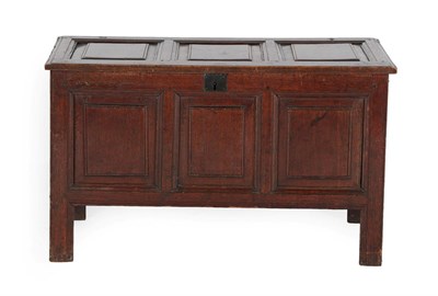 Lot 610 - An Early 18th Century Joined Oak Chest, the hinged lid with moulded panels enclosing a candle...