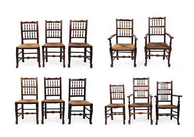 Lot 614 - A Matched Set of Eleven 19th Century Lancashire Ash and Rush Seated Dining Chairs, comprising seven