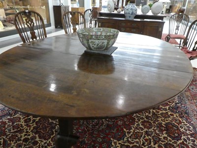 Lot 617 - A Ten to Twelve Seater Oak Gateleg Dining Table, 2nd quarter 18th century, with two rounded...