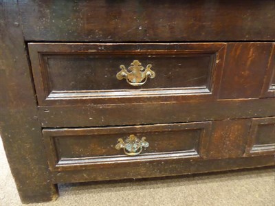 Lot 619 - A 17th Century Joined Oak Chest, the moulded hinged lid above three fielded panels, the base as...