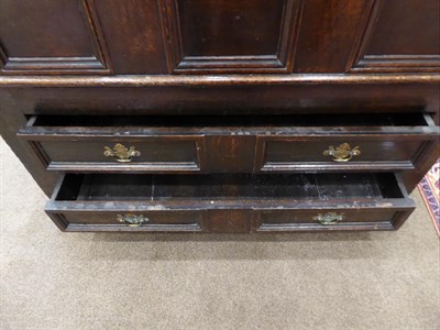 Lot 619 - A 17th Century Joined Oak Chest, the moulded hinged lid above three fielded panels, the base as...