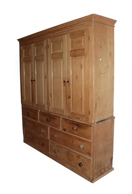 Lot 620 - A Victorian Pine Kitchen Press Cupboard, mid 19th century, the moulded cornice above four...