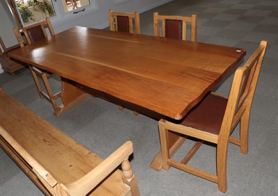 Lot 622 - An English Oak Refectory Style Table, modern, of rectangular wavy shaped form, on trestle end...