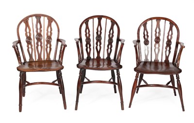 Lot 635 - A Matched Set of Six Yewwood Thames Valley Windsor Armchairs, 2nd quarter 19th century, the pierced