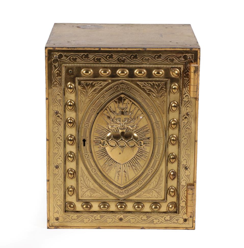 Lot 644 - A Victorian Brass Tabernacle, the hinged door applied with a brass panel with an oval decorated...