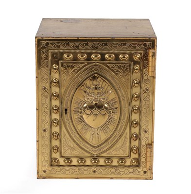 Lot 644 - A Victorian Brass Tabernacle, the hinged door applied with a brass panel with an oval decorated...