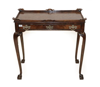 Lot 664 - A Walnut and Burr Elm Silver Table, in George II style, the quarter-veneered top within a...