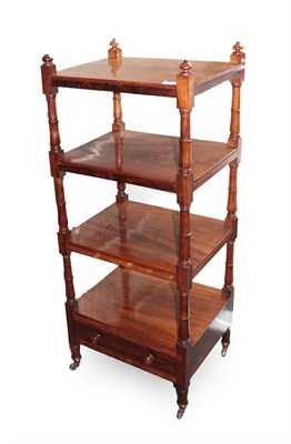 Lot 668 - A Regency Rosewood Four-Tier Whatnot, early 19th century, of rectangular form with turned supports