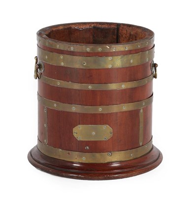 Lot 697 - A 19th Century Mahogany and Brass Bound Wine Cooler, of circular form with riveted brass...