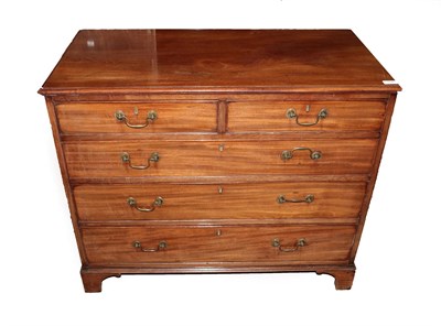 Lot 704 - A George III Mahogany Chest of Drawers, late 18th century, with two short over three long graduated