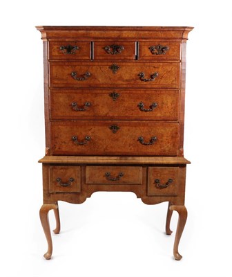 Lot 708 - A George II Figured Walnut and Feather-Banded Chest on Stand, mid 18th century, the moulded cornice
