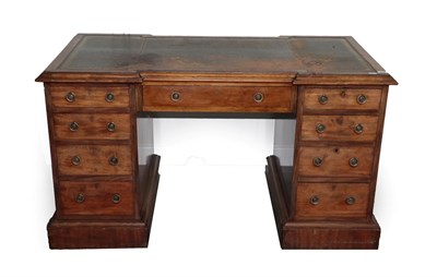 Lot 711 - A Victorian Mahogany Double Pedestal Desk, late 19th century, of inverted breakfront form, the worn