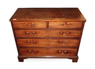 Lot 712 - A George III Mahogany Straight Front Chest of Drawers, late 18th century, the crossbanded top above