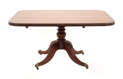 Lot 725 - A Regency Mahogany and Rosewood Crossbanded Pedestal Dining Table, early 19th century, of...