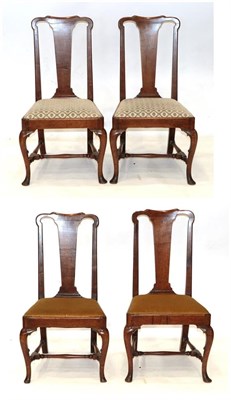 Lot 737 - A Set of Four Queen Anne Walnut Dining Chairs, early 18th century, with solid splats above...