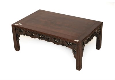 Lot 739 - A Chinese Hardwood Kang Table, mid 19th century, of rectangular shaped form with carved apron...