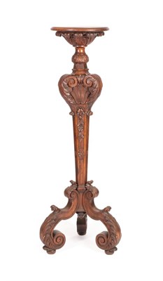 Lot 749 - An Italian Carved Walnut Plant Pedestal, late 19th century, with circular platform top and acanthus