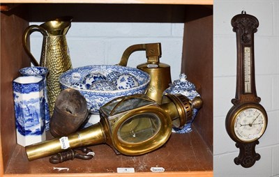 Lot 4 - A brass carriage lamp, brass ships bell dated 1839, ceramic carpet boules, blue and white...