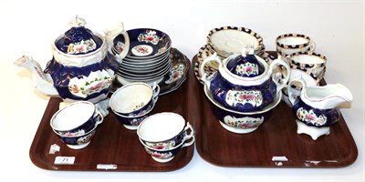 Lot 71 - A 19th century part tea service together with a late tea service
