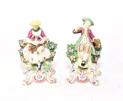 Lot 135 - A pair of 19th century Bocage figures of musicians