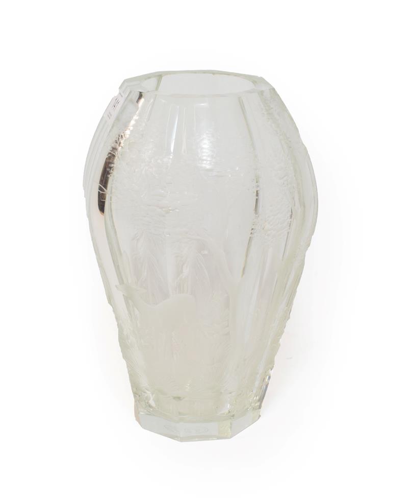 Lot 141 - A Moser glass vase, of octagonal design, wheel cut with a stag and doe in woodland, signed, 24cm