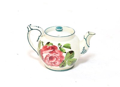 Lot 143 - A small Weymes ware tea pot and cover