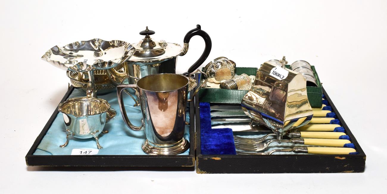 Lot 147 - Silver caddy, six silver napkin rings and a quantity of plated wares including a cased set of...