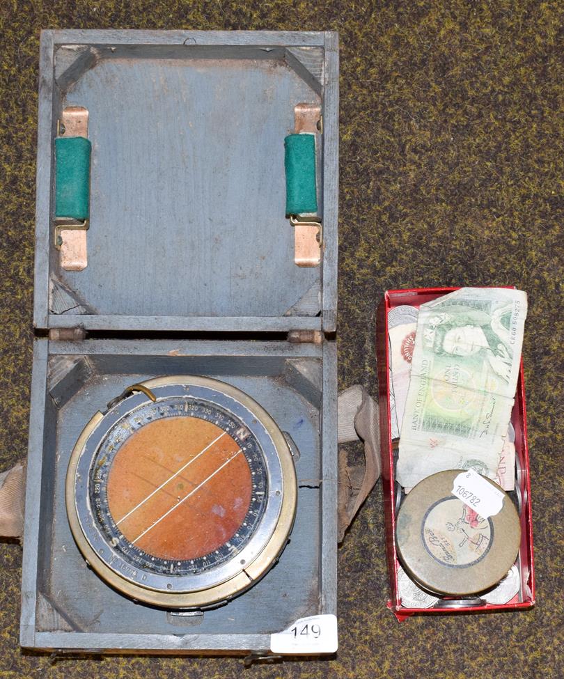 Lot 149 - A cased RAF compass together with a small group of coins, banknotes and a lantern