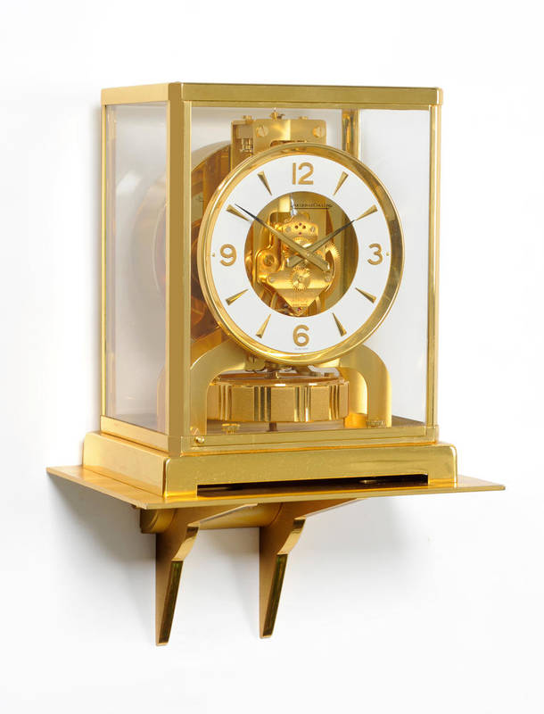 Lot 1020 - A Brass Atmos Clock with Wall Bracket, signed Jaeger LeCoultre, No.447726, circa 1985, the gilt...