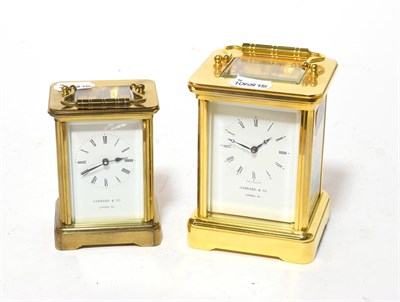 Lot 171 - A brass striking carriage clock, retailed by Garrard & Co, and a brass carriage timepiece...