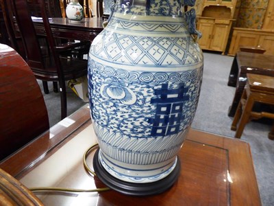 Lot 190 - A twin handled Chinese blue and white porcelain vase mounted as a table lamp together with a modern