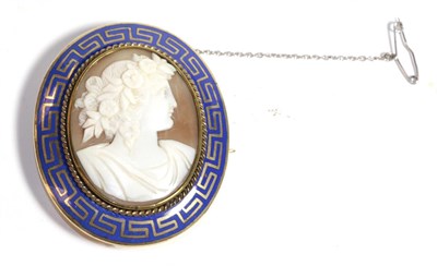 Lot 210 - A cameo brooch, with a blue enamelled frame, measures 4.7cm by 5.6cm