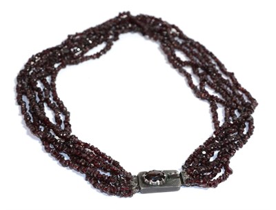 Lot 211 - A six strand garnet bead necklace, length 42.5cm