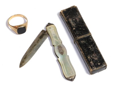 Lot 218 - A 9 carat gold onyx signet ring, finger size T; and a mother of pearl pen knife