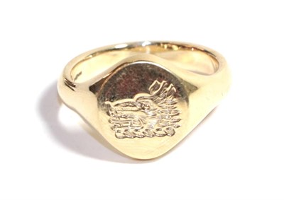 Lot 232 - A 9 carat gold signet ring depicting a wolf, finger size U1/2